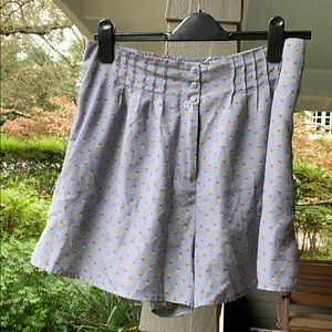 Kimchi Blue shorts with yellow flowers